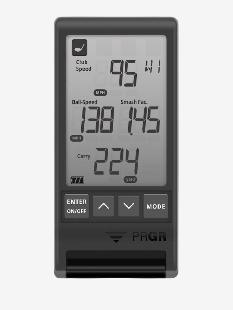 A digital display of the PRGR Black Portable Launch Monitor showing swing speed, ball speed, and carry distance.