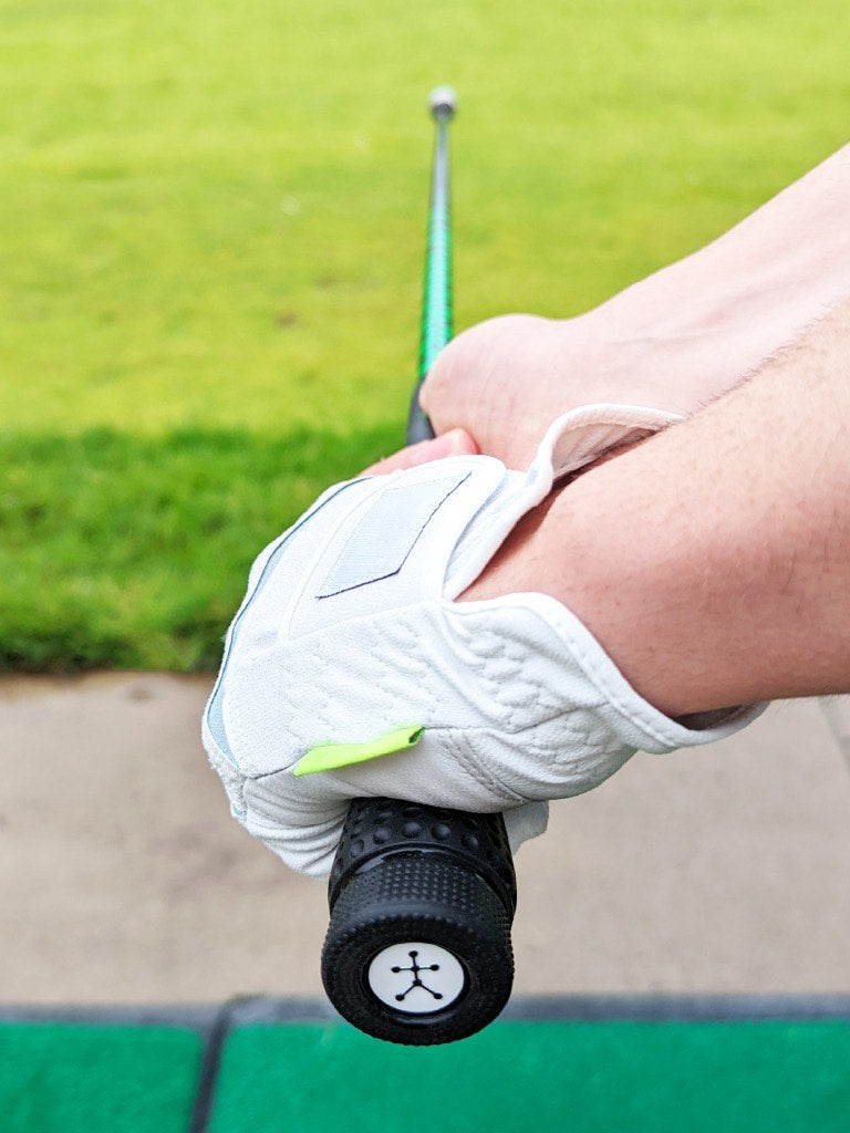 Close up shot of the Blast Motion on a grip