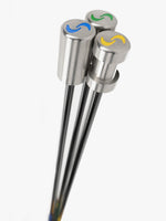 A set of three SuperSpeed golf training clubs, each with a different color grip: yellow, green, and blue, aligned vertically.